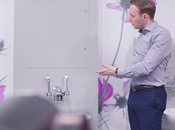 Cameron-talking-about-the-full-height-hygipod-basin